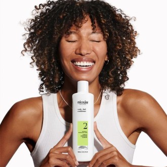 Nioxin System 2 Scalp + Hair Conditioner - kondicionierius slenkantiems nedažytiems plaukams, 300 ml 2